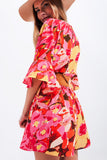 Wrap Playsuit in Fuchsia Floral