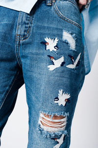 Blue wash mom jeans bird embroidery